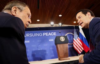 Russian foreign minister Sergei Lavrov and US secretary of state Marco Rubio talk as they attend a press conference held by US president Donald Trump and Russian president Vladimir Putin